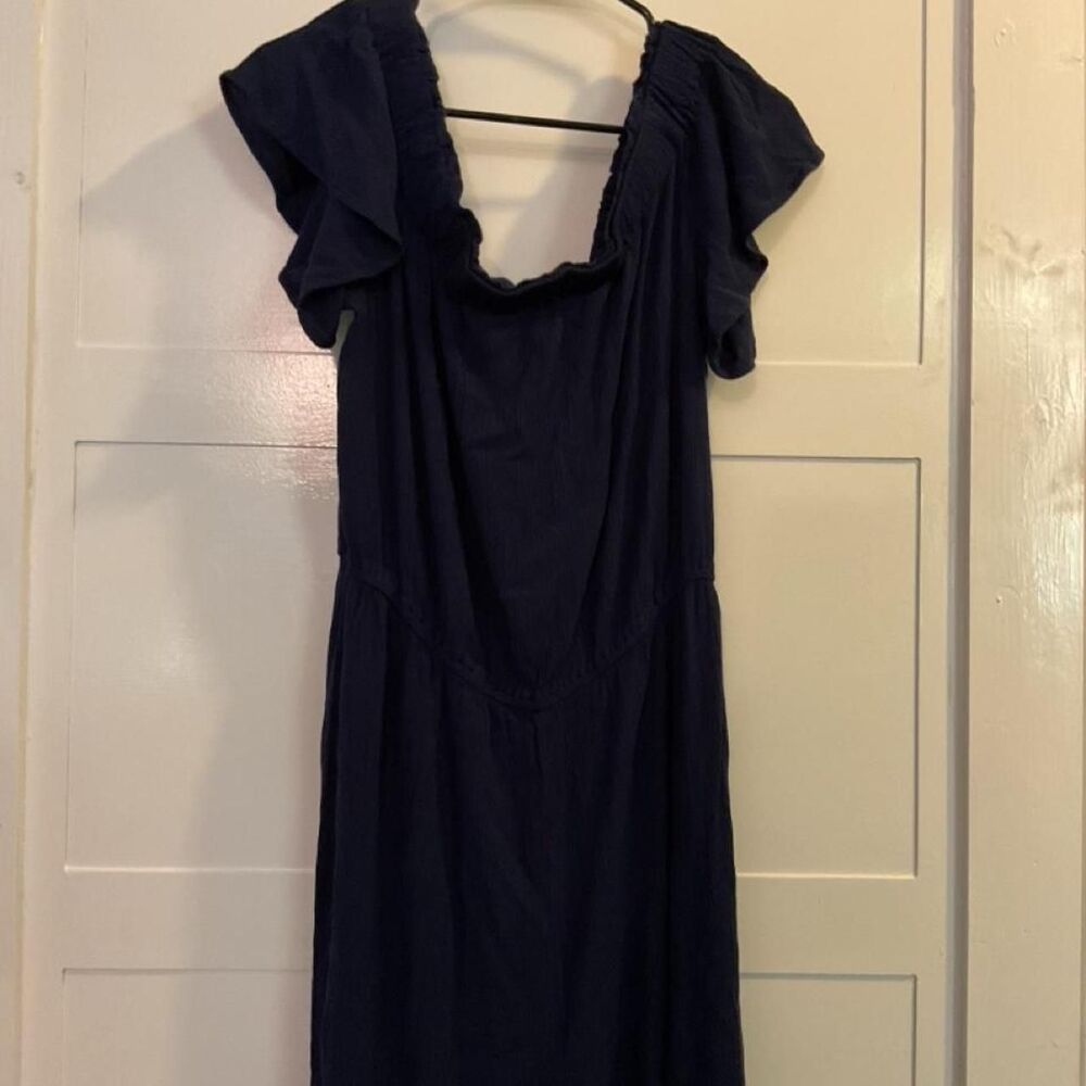 Navy blue maxi dress with ruffle neckline and cap sleeves. MUDPIE
